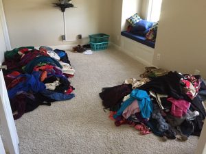 Image result for two piles of clothes